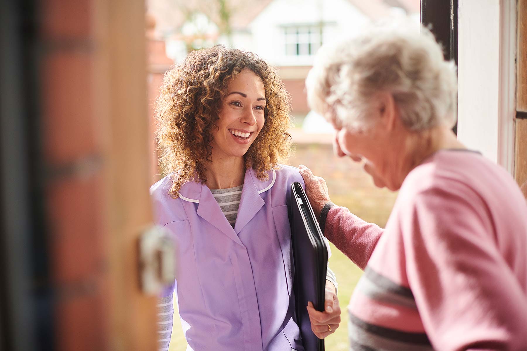 Senior with Care Team Member